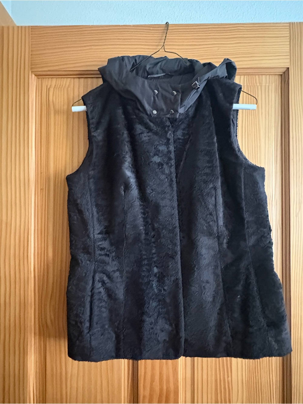Max Mara women’s faux fur vest.